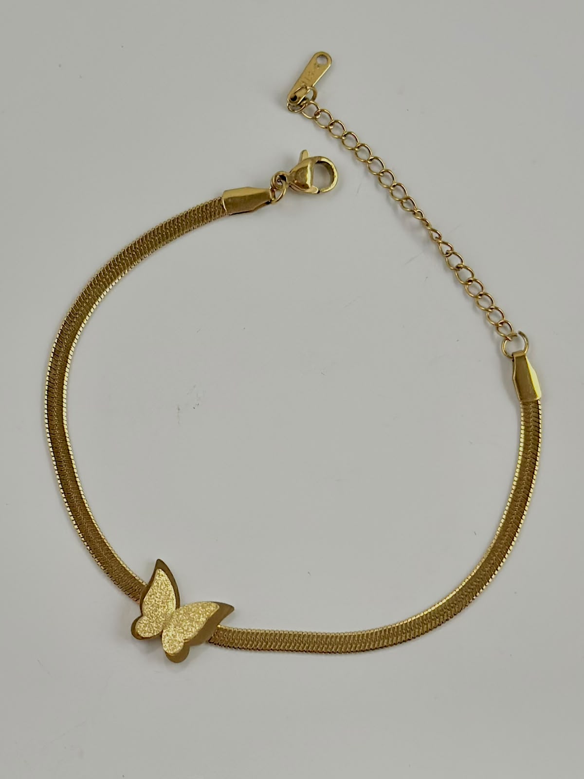 Bloslily Frosted Butterfly Chain Bracelet featuring delicate double butterfly charms on a sleek jewelry chain.
