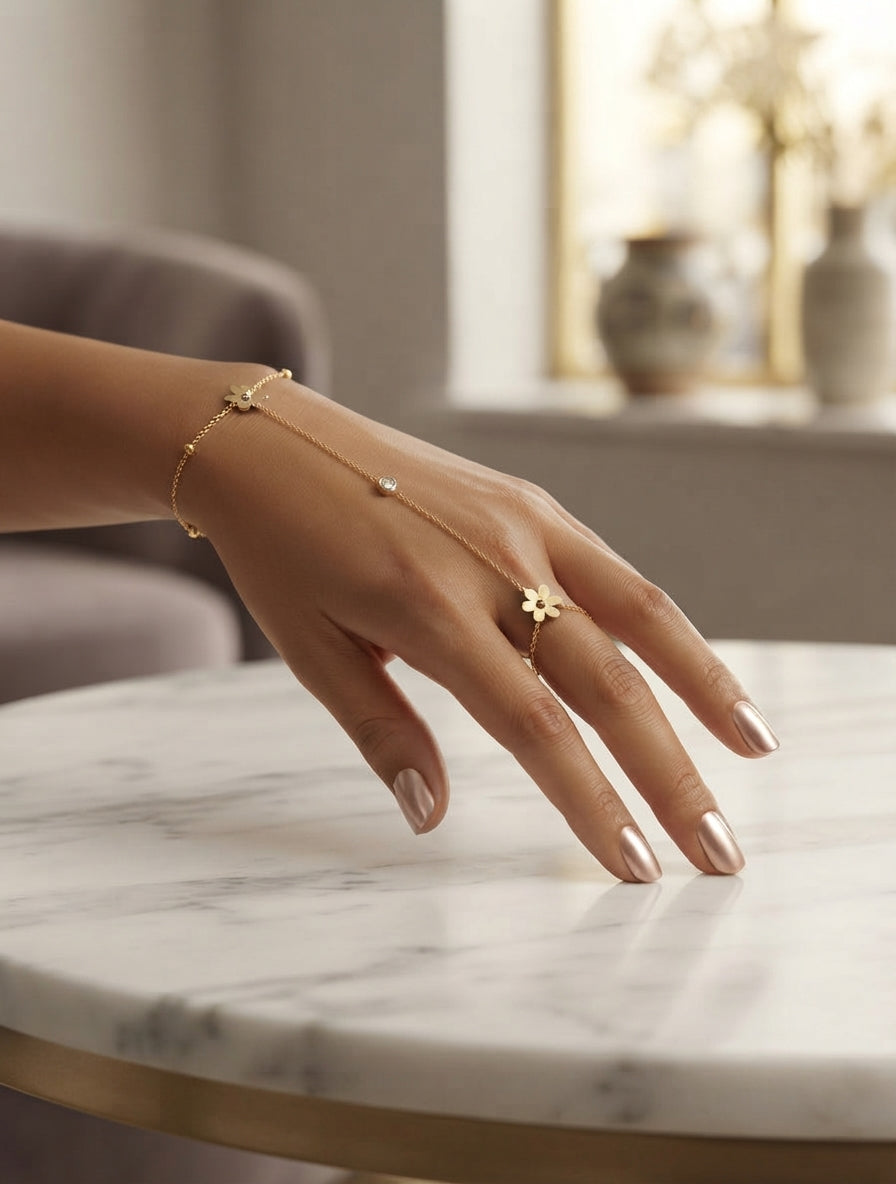 Elegant floral crystal hand chain jewelry by Bloslily featuring intricate floral designs and sparkling crystals on a delicate chain.