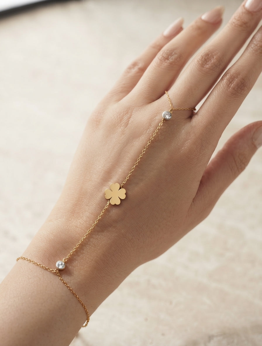 Dainty leaf and crystal hand chain jewelry by Bloslily featuring delicate leaf charms and sparkling crystals on a fine chain.