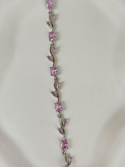 Pink and silver tulip-shaped jewelry bracelet by Bloslily featuring delicate floral design and elegant craftsmanship.
