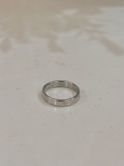 Silver Cartier Style Love Ring by Bloslily featuring a sleek band with signature Love design and engraved details.