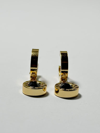 Black stone drop hoop earrings with Roman numerals by Bloslily, showcasing sleek black jewelry design.