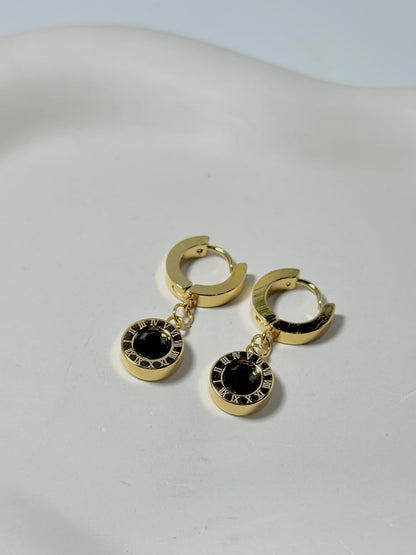Black stone drop hoop earrings with Roman numeral design by Bloslily, showcasing elegant jewelry with a modern, stylish look.