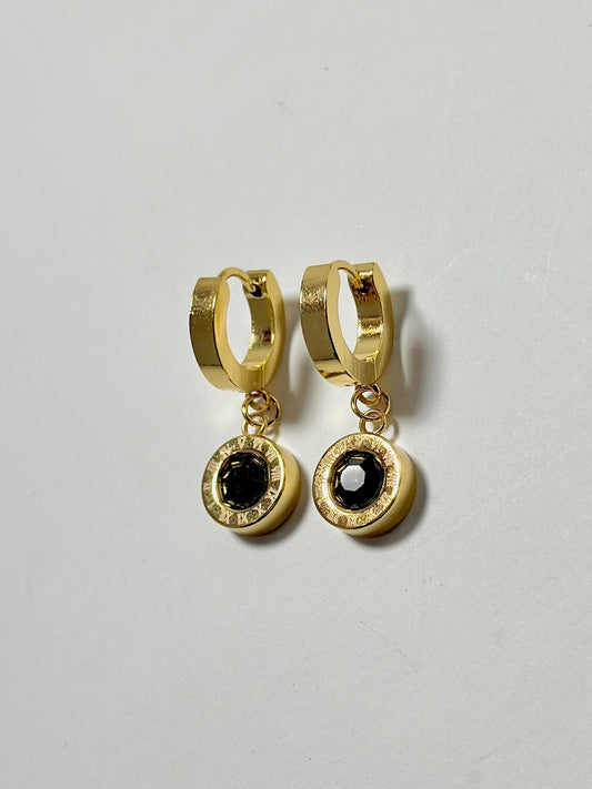 Black stone drop hoop earrings with Roman numeral design, by Bloslily jewelry, featuring sleek black stones and elegant hoop style.