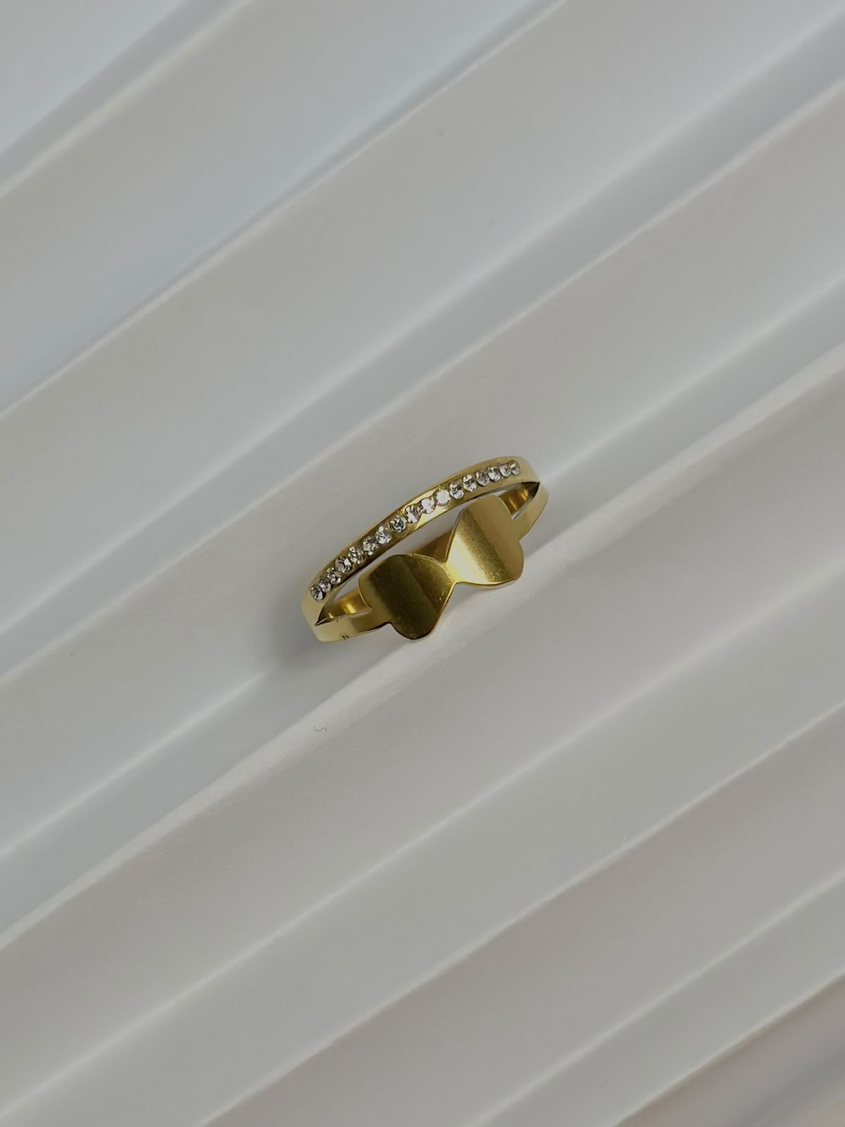 Bloslily double layer bow crystal ring featuring sparkling crystals and a butterfly design on a silver band.