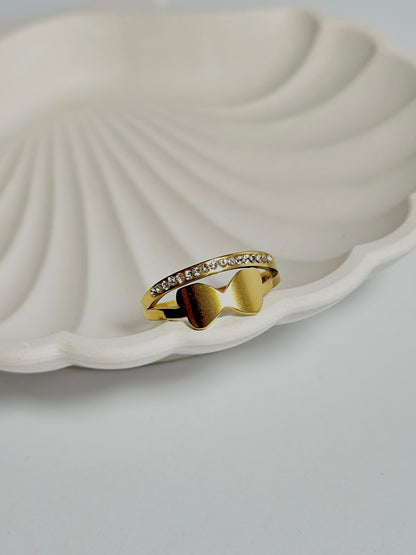 Bloslily double layer bow crystal ring featuring sparkling crystals and a delicate butterfly design on a silver band.