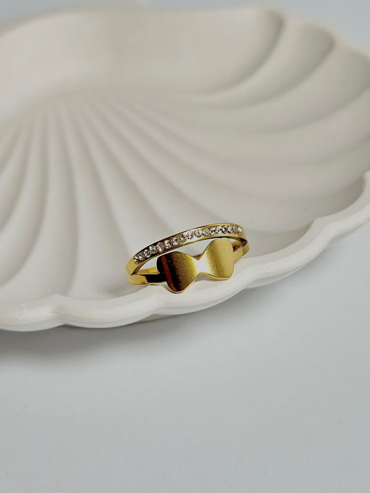 Bloslily double layer bow crystal ring featuring sparkling crystals and a delicate butterfly design on a silver band.