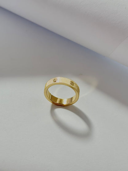 Bloslily Cartier style screw ring, jewelry piece with sleek design and metallic finish, close-up view of the ring's details.