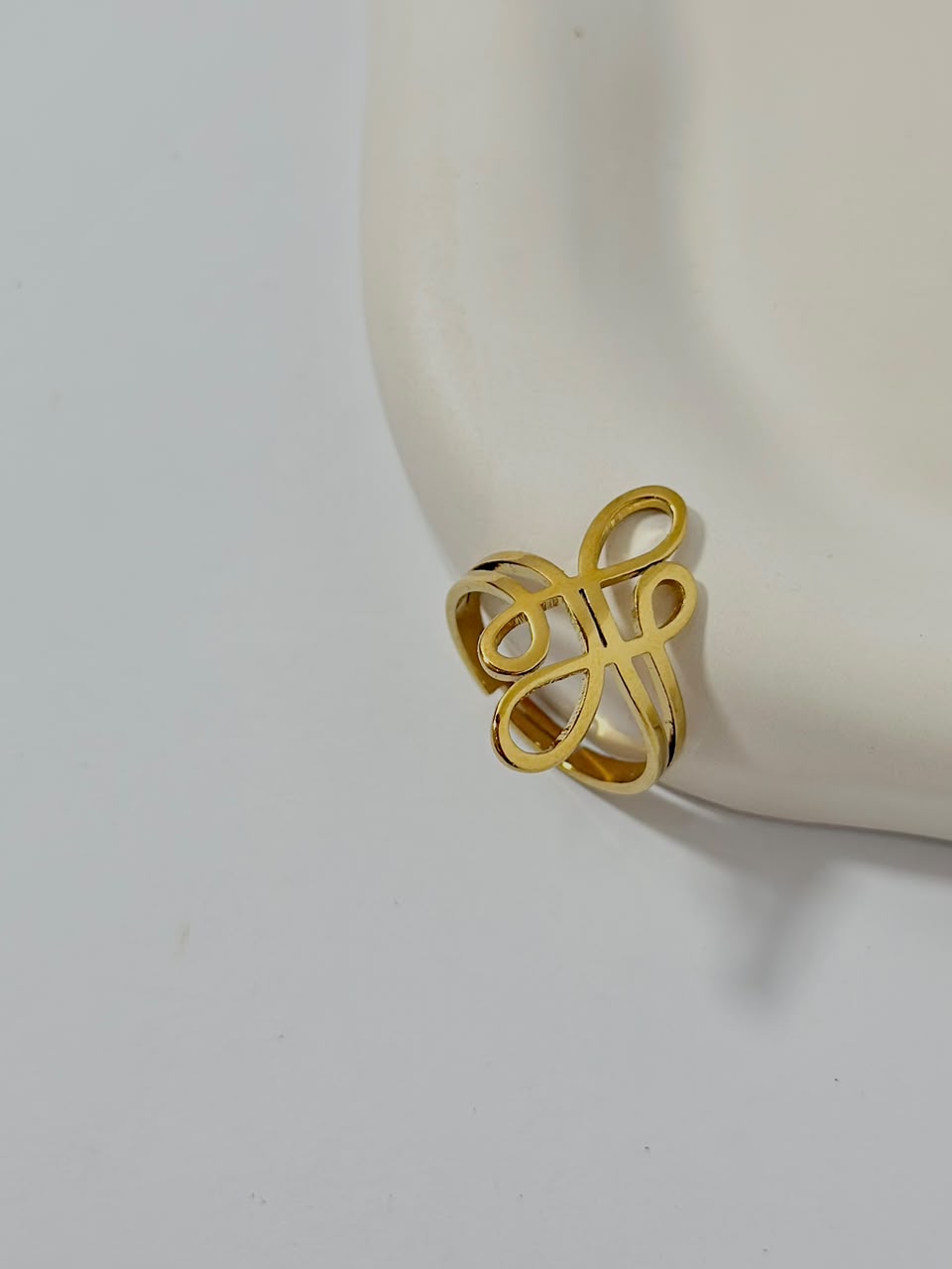 Bloslily Bowknot adjustable jewelry ring with a delicate bow design, showcasing a stylish and versatile accessory.