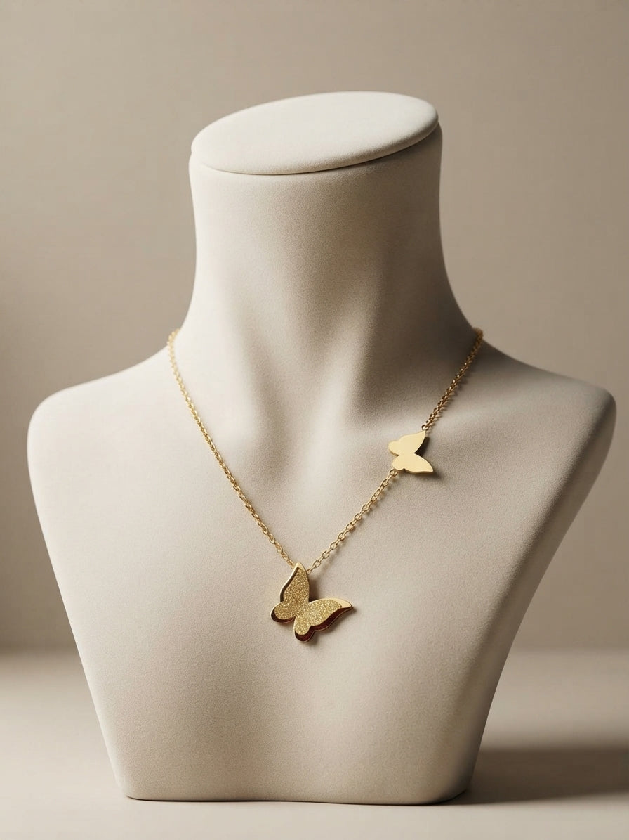 Frosted dual butterfly pendant necklace by Bloslily, featuring two intricately designed butterflies on a delicate chain.