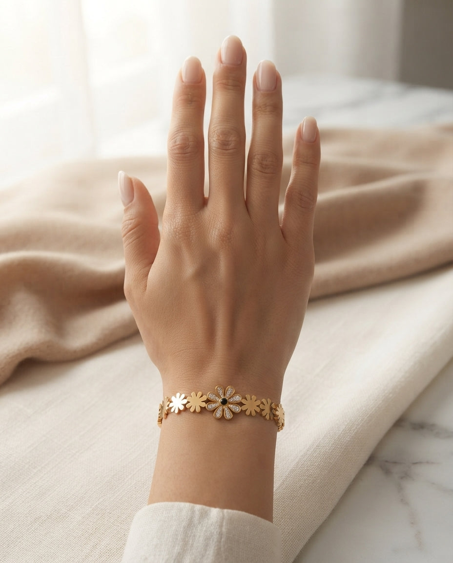 Dainty Daisy Crystal Bangle by Bloslily, silver jewelry with delicate daisy flower and sparkling crystal accents.