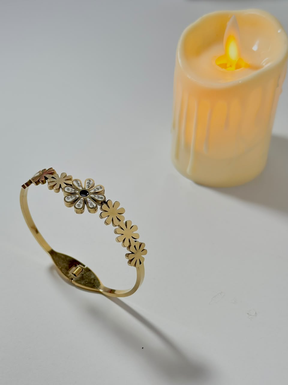 Dainty Daisy Crystal Bangle by Bloslily featuring delicate flower-shaped design with sparkling crystals for elegant jewelry style.