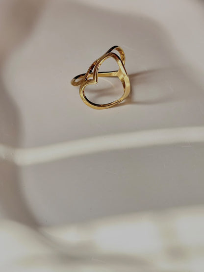 Bloslily heart-shaped adjustable jewelry ring with a funky, bold design on a white background