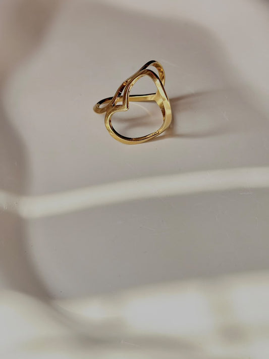 Bloslily heart-shaped adjustable jewelry ring with a funky, bold design on a white background
