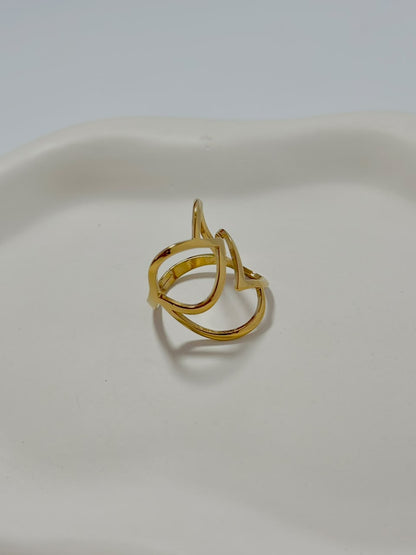 Funky double leaf adjustable jewelry ring by Bloslily featuring two layered leaf designs on a silver band.