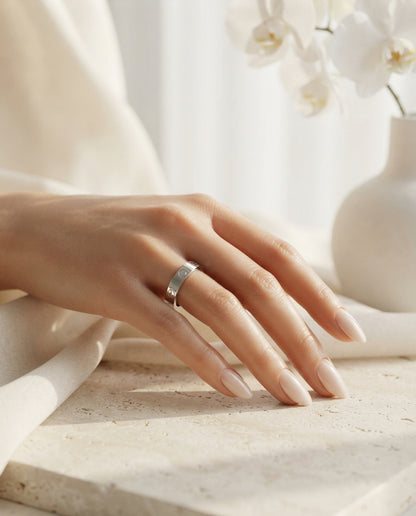 Silver Cartier Style Love Ring by Bloslily, detailed jewelry piece with a sleek silver finish and elegant design.