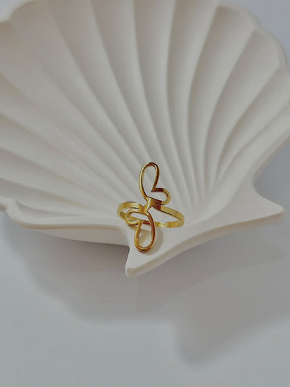 Abstract butterfly adjustable jewelry ring by Bloslily featuring a modern butterfly design in silver-toned metal.