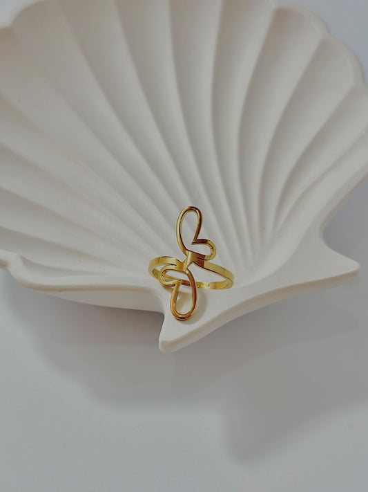 Abstract butterfly adjustable jewelry ring by Bloslily featuring a modern butterfly design in silver-toned metal.