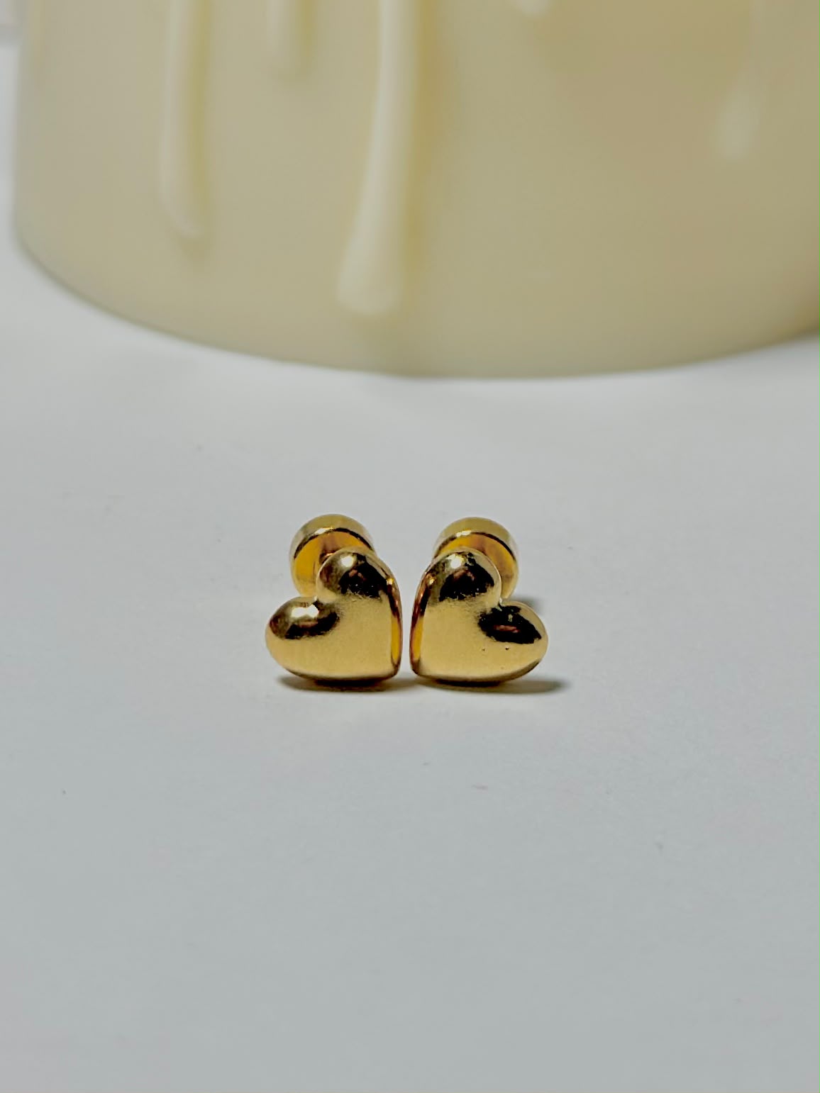 Bloslily Puffy Heart Screw-Back Stud Earrings featuring gold-tone hearts with a glossy finish and secure screw-back posts.