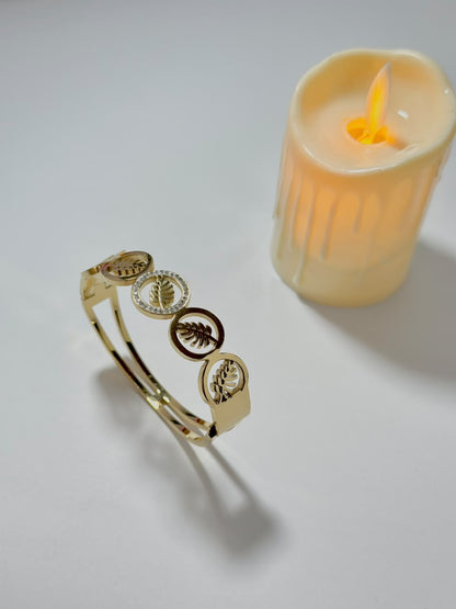 Bloslily Monstera leaf crystal handcuff jewelry featuring a detailed leaf design with sparkling crystals.