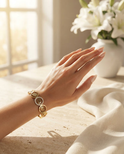 Bloslily Monstera leaf crystal handcuff jewelry featuring a leaf-shaped design with sparkling crystals on a silver-tone cuff.