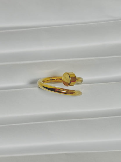 Silver nail ring jewelry by Bloslily featuring a sleek, modern design worn on a finger.