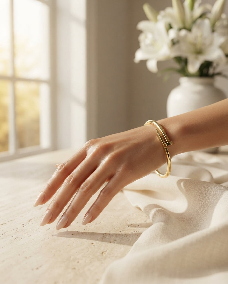 Jewelry nail handcuff from Bloslily featuring metallic design and intricate details, worn as a unique finger accessory