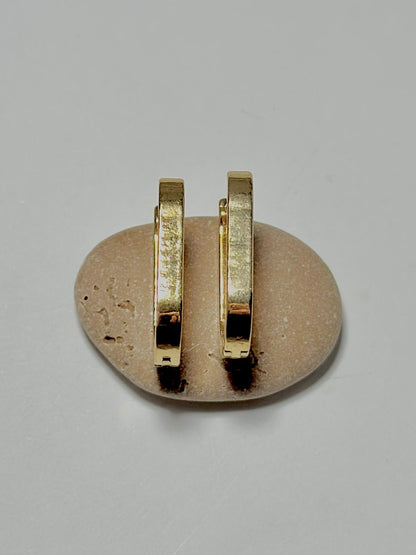 Bloslily U-shape geometric earrings with oval design, showcasing modern jewelry style and sleek silver finish.