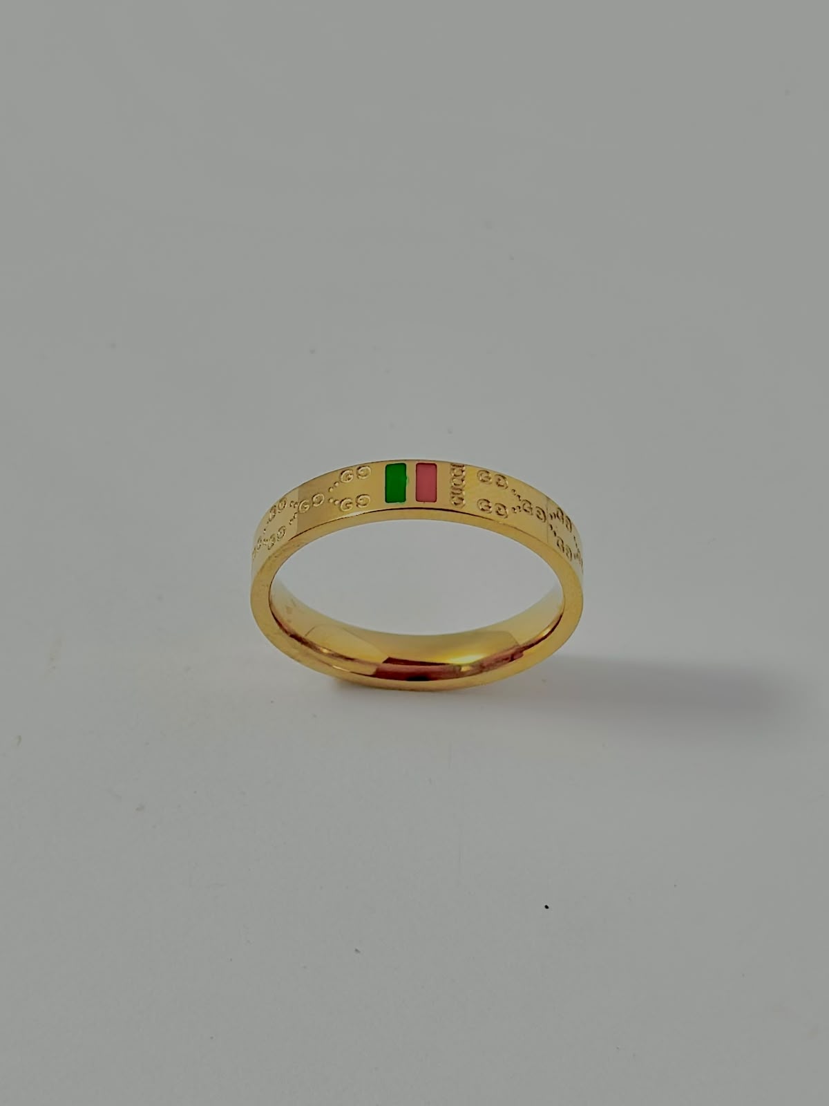 Red and green Gucci-style jewelry ring by Bloslily featuring a bold design and polished finish.