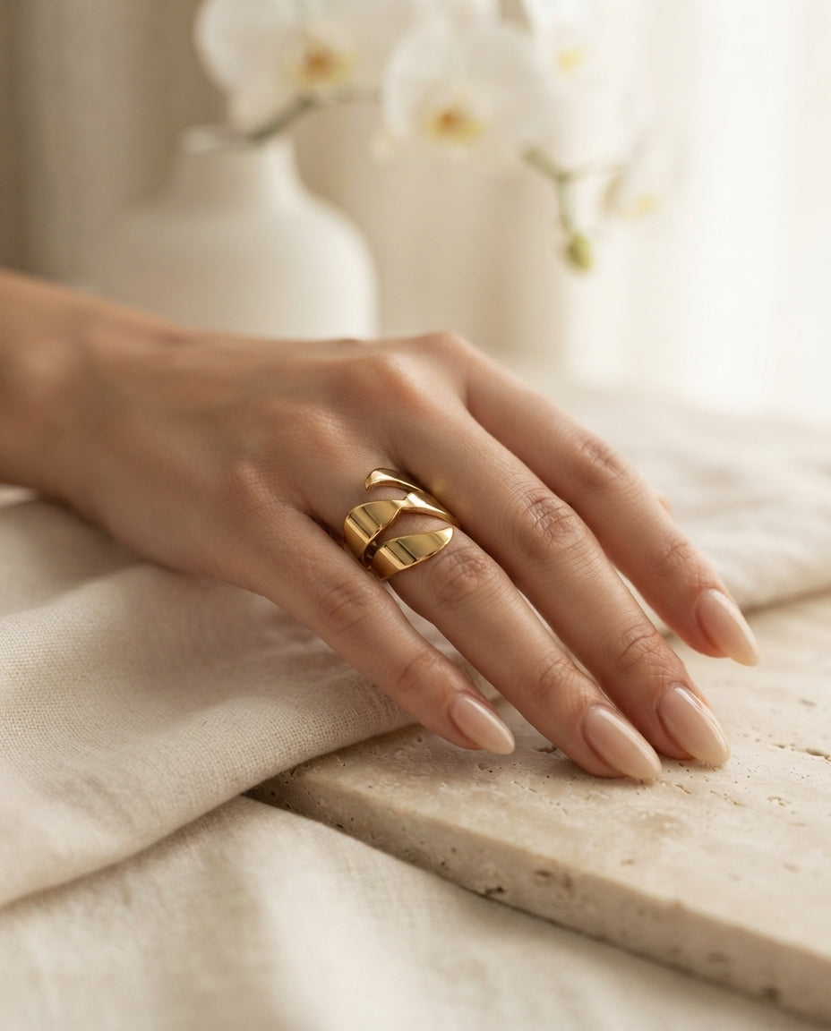 Spiral multi-layer adjustable jewelry ring by Bloslily, featuring a stylish layered design on a white background.