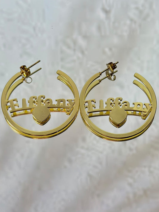 Bloslily Tiffany Style nameplate hoop earrings featuring delicate jewelry design and elegant metal detailing.