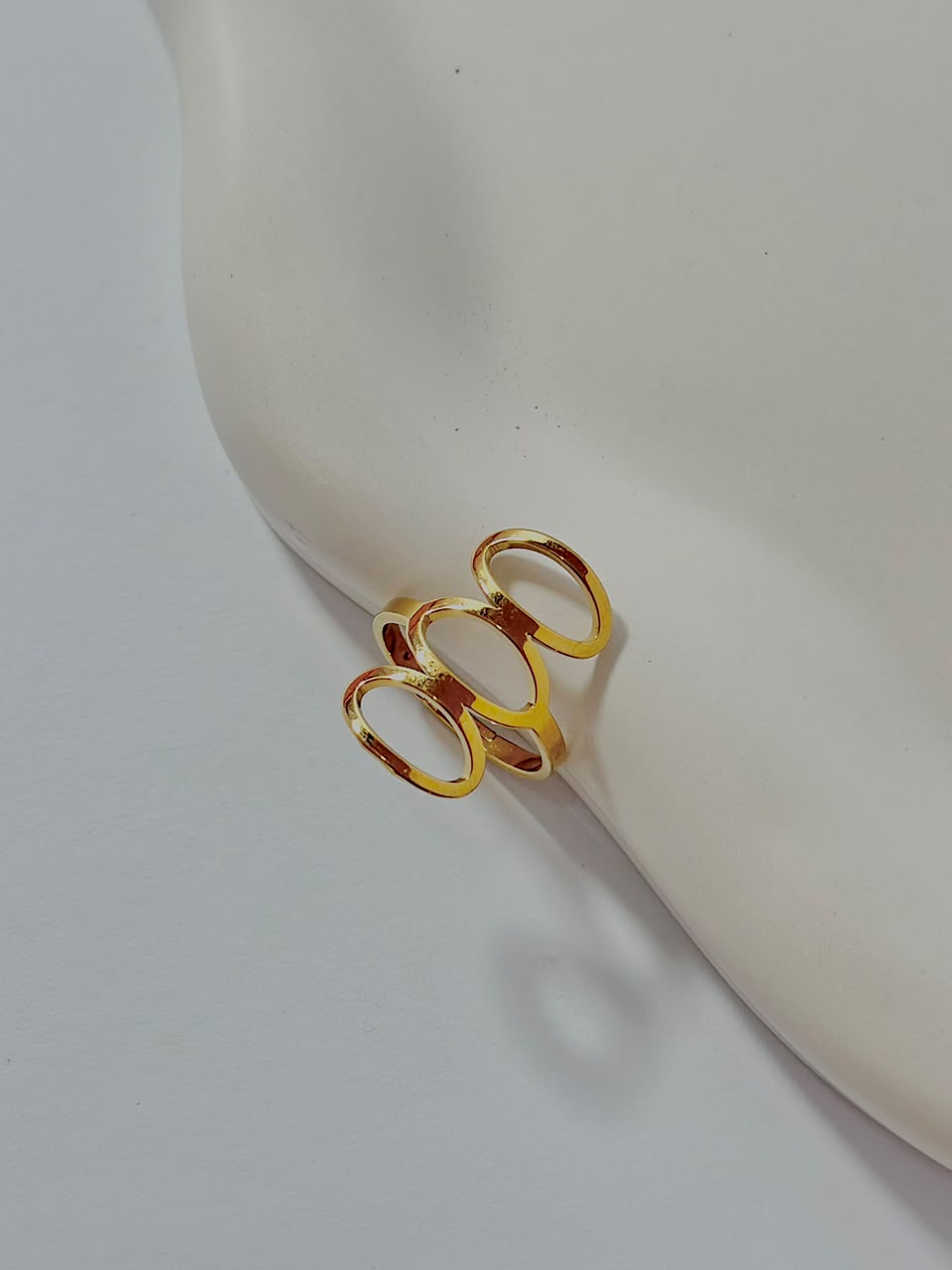 Silver triple hollow oval adjustable ring from Bloslily, featuring a sleek, modern jewelry design with open oval shapes and adjustable band.