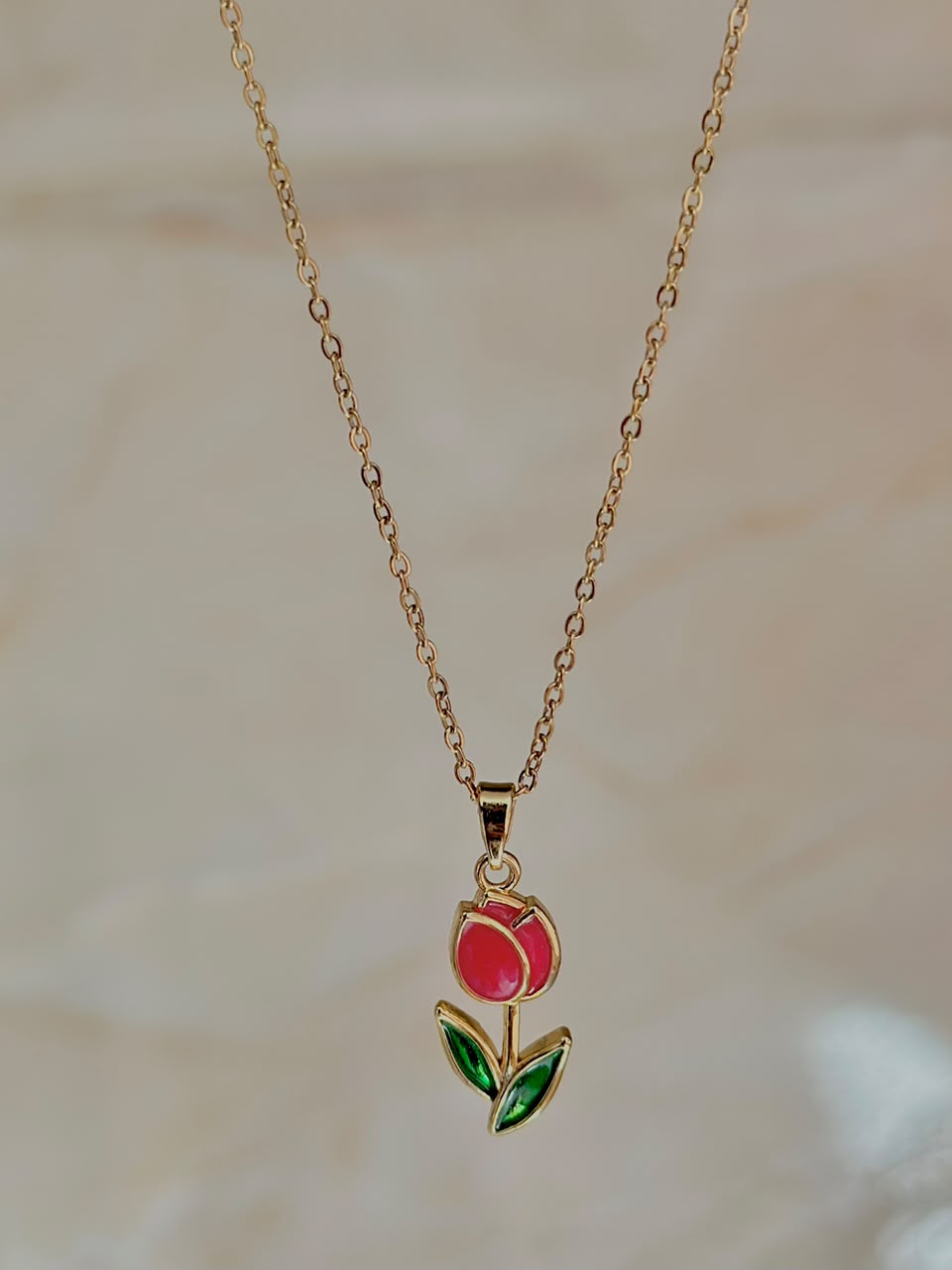 Elegant Tulip Necklace jewelry by Bloslily featuring a delicate flower pendant on a silver chain.